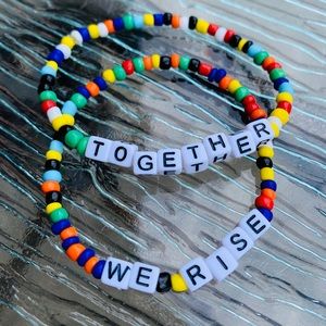 Together We Rise elastic cord bracelet